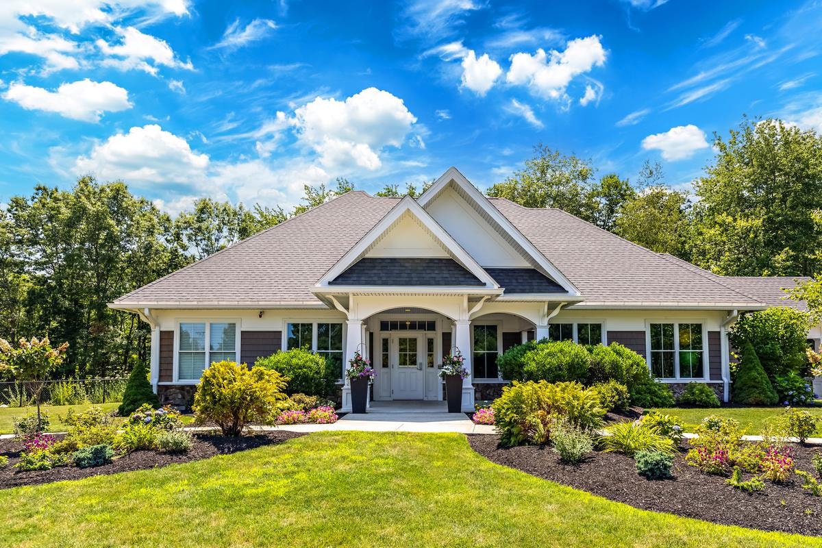 Clubhouse exterior with landscaped gardens